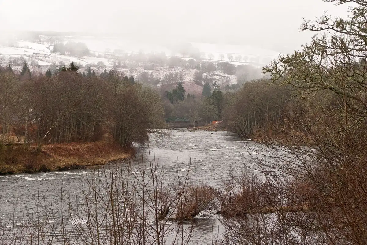 The wooded Tay valley west of Grandtully under winter snow